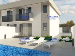 Casa Bi/Trifamiliare in Residenziale