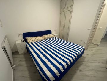 Camera da letto - Trilocale in Affitto in Viale del Tirreno 173 a Pisa