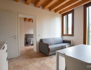 Soggiorno - Quadrilocale in Affitto in Via Savonarola a Padova