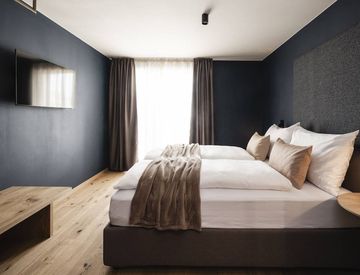 Camera da letto - Monolocale in Vendita in Piazza Municipio a Dobbiaco