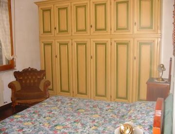 Camera da letto - Bilocale in Affitto in Via Federico Tesio 4 a Pisa