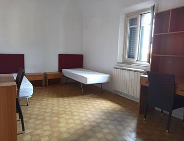 Camera da letto - Quadrilocale in Affitto in Via Cammeo Carlo Salomone 1 a Pisa