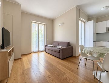 Soggiorno - Bilocale in Affitto in Via dei Carracci 6 a Milano
