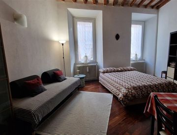 Camera da letto - Monolocale in Affitto in zona Centro a Parma