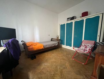 Camera da letto - Bilocale in Affitto in Via Savona 1 a Pisa