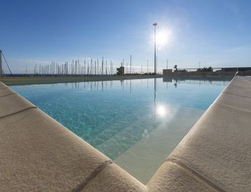 Piscina - Bilocale in Vendita in Via Gianni Cozzi 1 a Santo Stefano al Mare