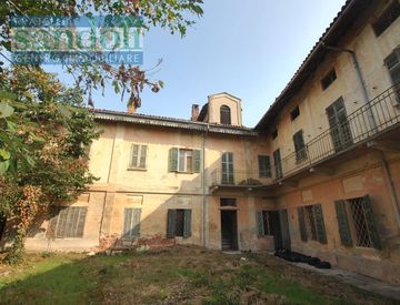 Foto 1 di 11 - Casa indipendente in Vendita in Via Roma a Pezzana