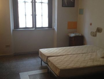 Camera da letto - Trilocale in Affitto in Largo Ciro Menotti a Pisa