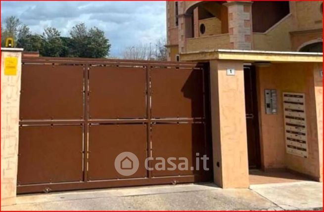 Box/posto auto in residenziale in Via Eugenio Sanna 1