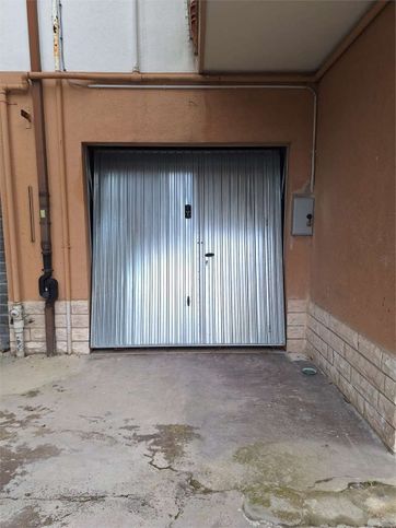Box/posto auto in residenziale in Via Vittorio Veneto 21