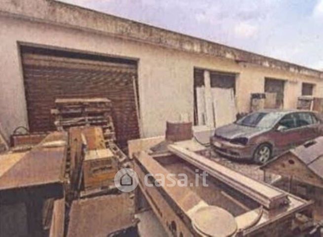 Box/posto auto in residenziale in Via Nettunense 32