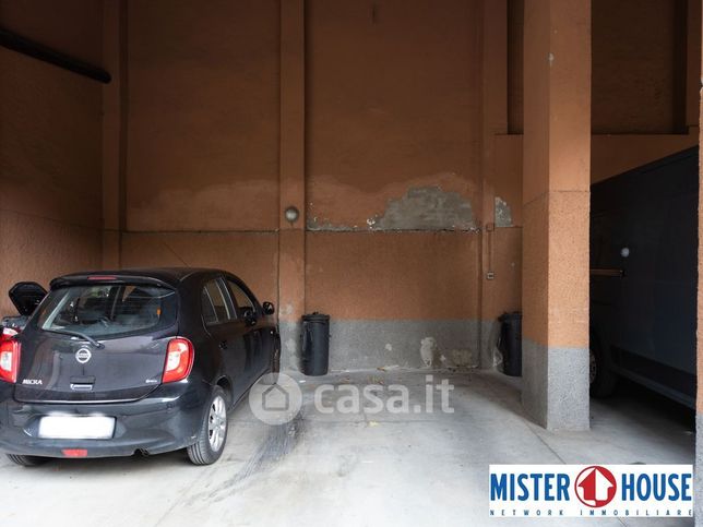 Box/posto auto in residenziale in Via Libertà 7